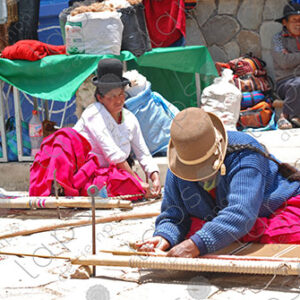 Bolivian women with their looms