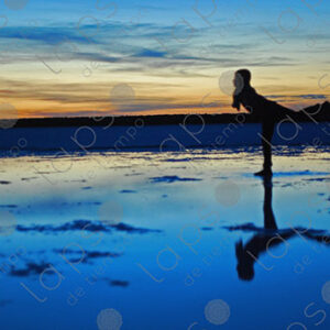 Child in Silhouette at Sunrise in Salar de Uyuni