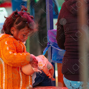 Girl playing with a doll