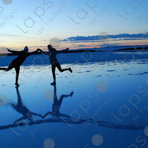 Hand-in-Hand Couple at Sunrise in Uyuni