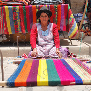 Woman shows her loom