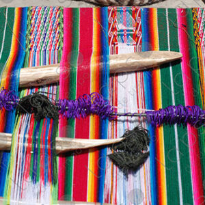 Lama bones on colorful loom