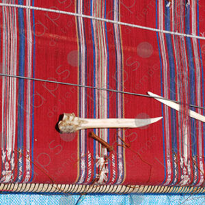 Lama bones on colorful loom