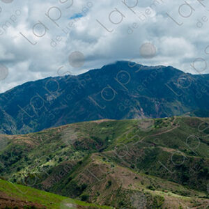 Landscape of Green Hills and Clouds