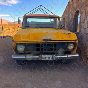 Old yellow truck in the desert