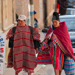Woman and men wearing traditional Tarabuco attire