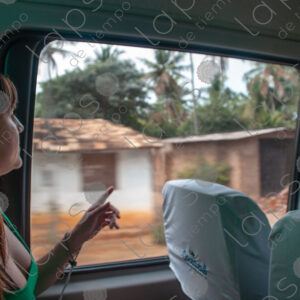 Tourist looking out of the bus window