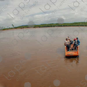 Barge crossing the river