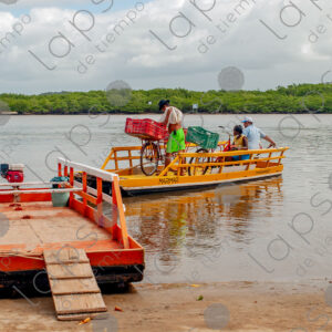 Barge crossing the river