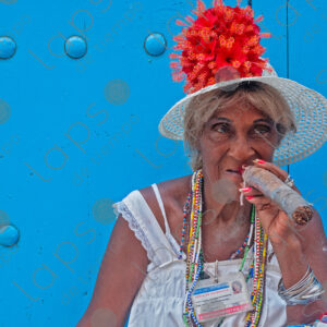 Cuban woman portrait with cats and a cigar