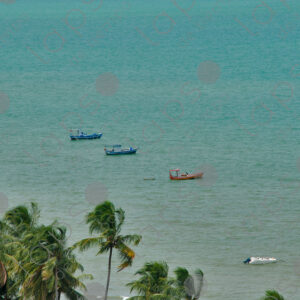 Four boats in turquoise sea