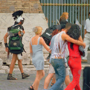 Gladiator for tourist photos in front of the Roman coliseum