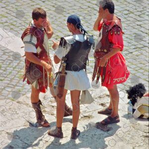 Gladiators for tourist photos in front of the Roman coliseum, Rome Italy