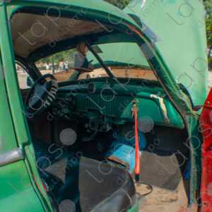 Glove compartment of a vintage green car