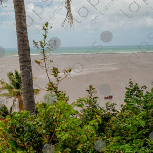 Landscape with a horizon of turquoise sea and brown