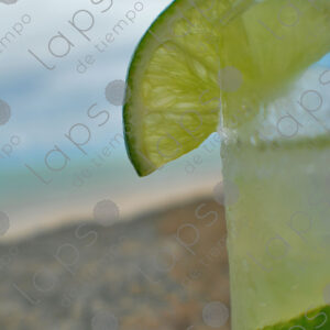 Lemon detail in caipirinha glass