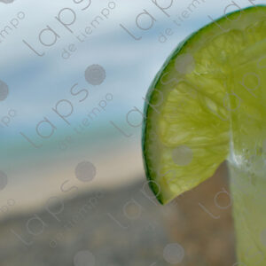 Lemon detail in caipirinha glass