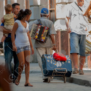 Man carrying an accordion