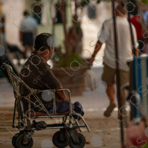 Man in a wheelchair on the street