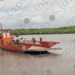 Small ferry arriving at the port