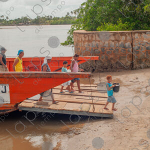 Small ferry arriving at the port