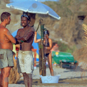 Torvaianica, beach, two men are talking, Italy