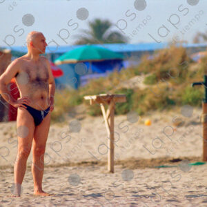 Torvaianica man in swimsuit, summer, Italy