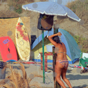 Torvaianica shower on the beach, woman, Italy