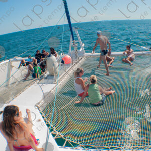 Tourists on a yacht sunbathing