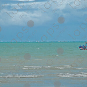 Turquoise sea and fishing boats