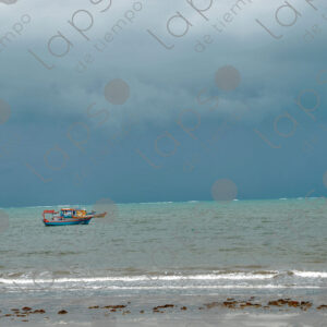 Turquoise sea and fishing boats