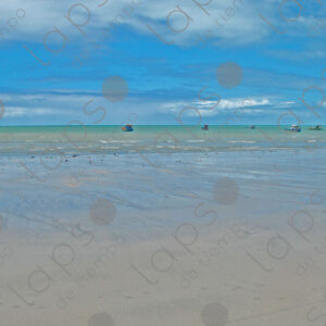 Turquoise sea and fishing boats