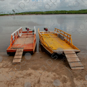 Two barges on the riverbank