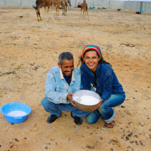 A camel breeder and a Western woman, Morocco