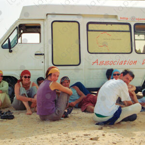 Group traveling in the Sahara desert