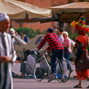 Guerrab Walking in the Atmosphere of Jemaa el-Fna Square, Marrakech