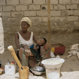 Islamic Woman with Baby and Mortar