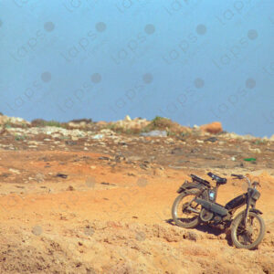 Isolated Motorcycle and Waste in Rabat