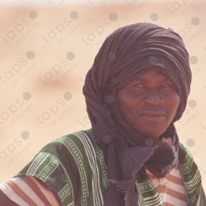 Portrait of a Sahrawi man wearing a black turban in the Western Sahara Desert