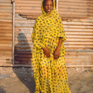 Portrait of a Teenage Girl with Melhfa Clothing Sahrawi Dress