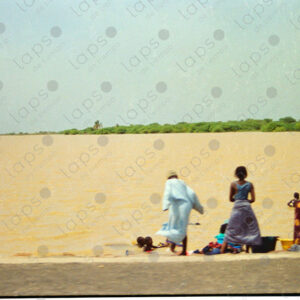 Senegal River with some people seen from a moving car