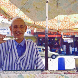 Tooth Vendor in Islamic Attire Portrait, Jemaa el-Fna Square Marrakech