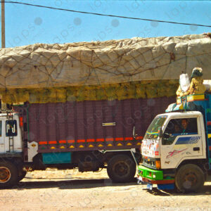Trucks Loaded with Grass in a Parking Lot in the City of Fez, Morocco