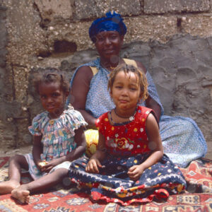 Two Girls Sitting on the Ground