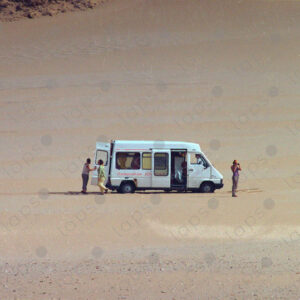 Van in the middle of the Western Sahara desert