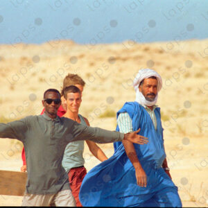 Walking to dig up the car in the Western Sahara desert
