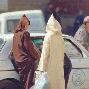 Women Get into a Taxi in Rabat